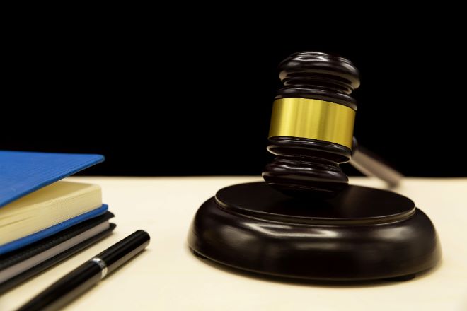 Domestic-violence-law-on-a-wooden-table_(1)
