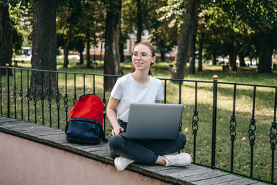 Student-loan-student-finance-for-undergraduates-outdoor-portrait-of-student-girl